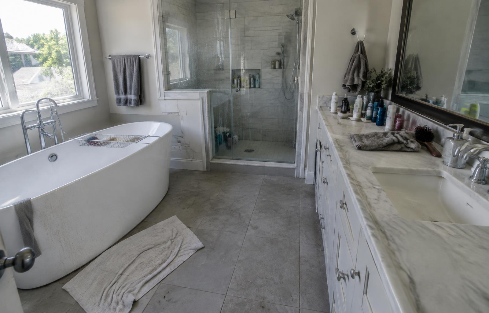 Bathroom before cleaning, with water spots and buildup